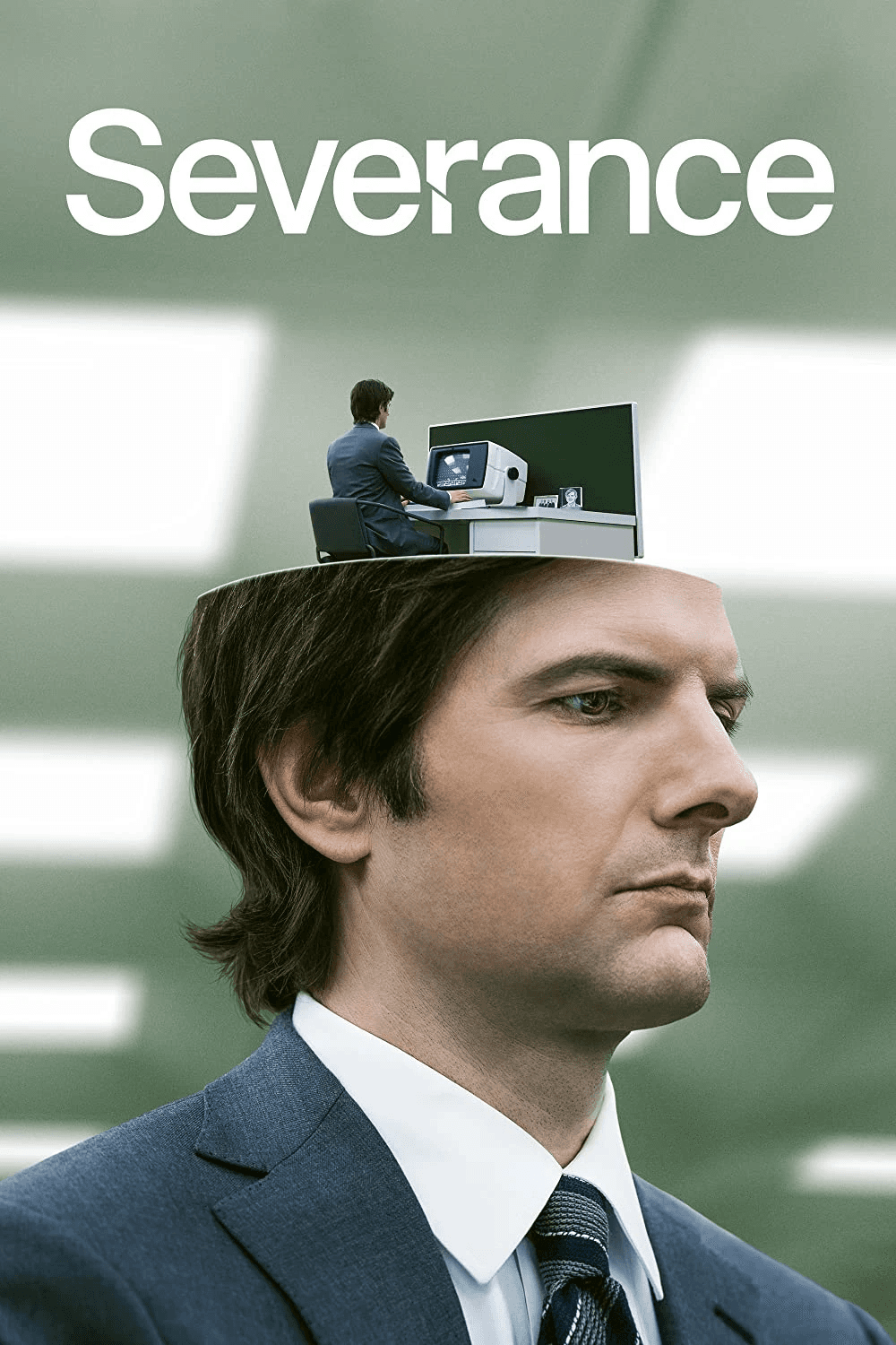 Promotional poster for the series “Severance,” featuring a man in a suit with the top of his head opened to reveal a smaller version of himself working at a desk in a sterile office setting.